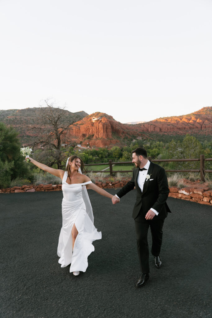 Bride and Groom take golden hour photos in Sedona, Arizona on wedding day